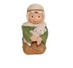 Pastor oveja arrodillado