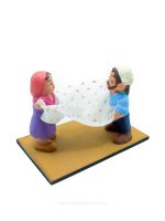 Pastores doblando sábanas