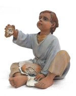 Niño dando pan 20cm.